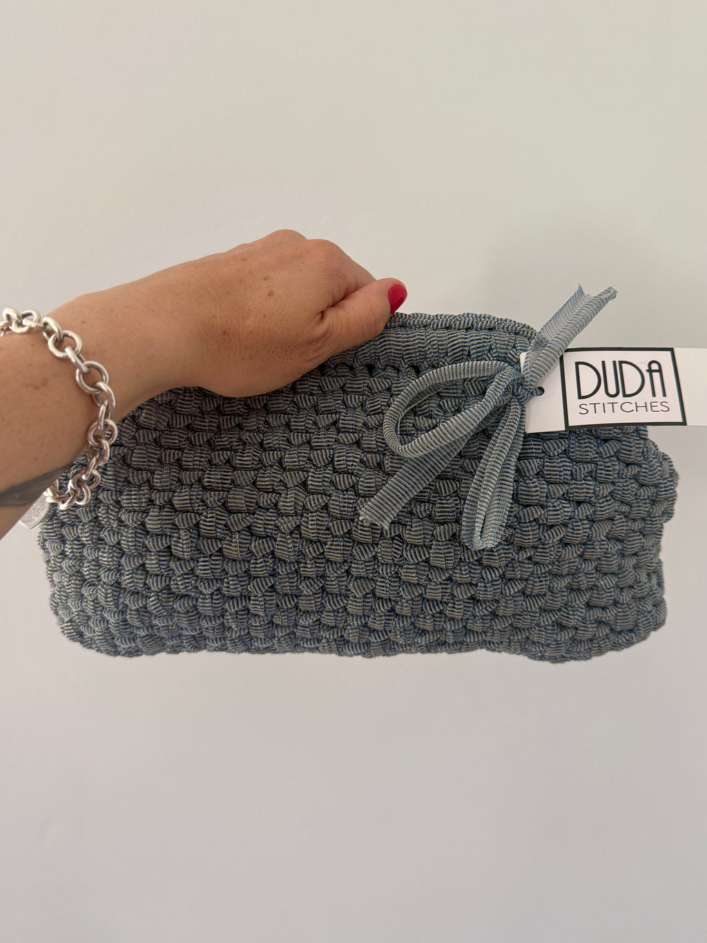 NOCCIOLA pochette standard in tulle azzurro senza manico